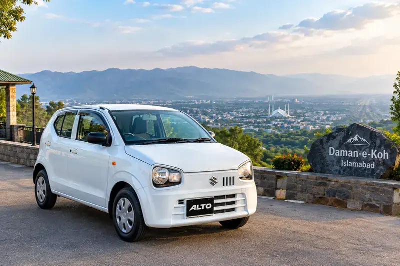 White Suzuki Alto VXR hatchback available for rent in Islamabad