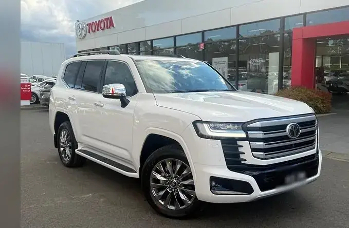 White Toyota Land Cruiser V8 SUV available for premium travel in Pakistan