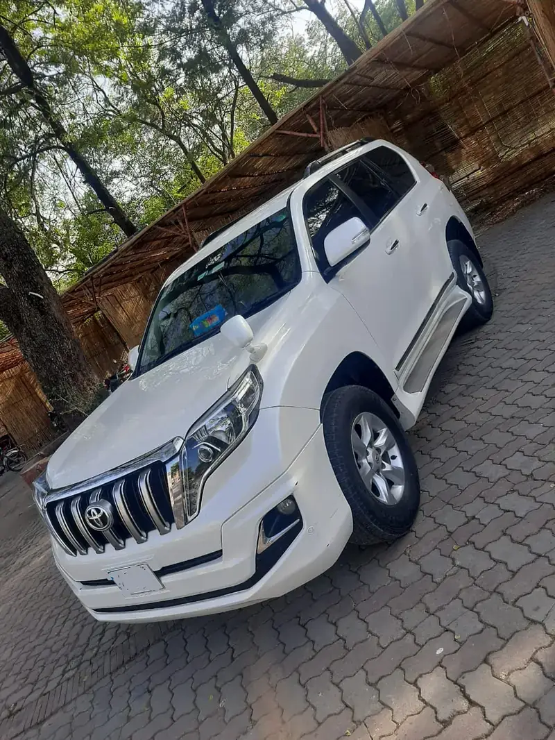 Black Toyota Land Cruiser Prado SUV available for premium travel in Pakistan